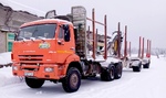 Log truck KAMAZ 65111 with a trailer